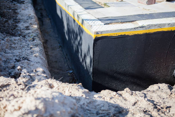 Professional Emergency Waterproofing technician working in Flemington, NJ